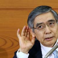 All ears: Bank of Japan Gov. Haruhiko Kuroda faces reporters April 26 in Tokyo. JGB yield spikes raise alarm bells