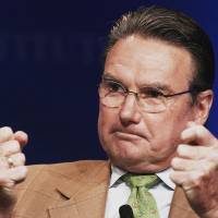 Double-fisted: Jimmy Connors speaks at the annual Milken Institute Global Conference in California on May 1. Jimbo's memoir mirrors his alpha-male tennis career