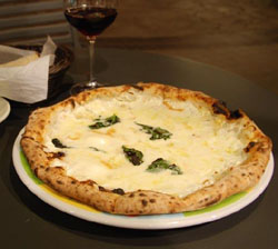 Enoteca Cricca A four-cheese Teanese pizza at Eataly | ROBBIE SWINNERTON PHOTOS
