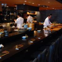 Ringside seats: Pull up at the counter to see Namikibashi Nakamura’s chefs at work. Namikibashi Nakamura: Celebrating spring with sake and seasonal fare