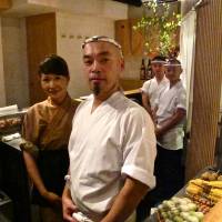 Poultry pros: Chef Yoshiteru Ikegawa with his wife, Minako, and kitchen crew. Torishiki: Where a yakitori artisan rules the roost