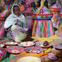 Worlds of color: A basket-seller in Aksum. Delving into Ethiopia's ancient past and present