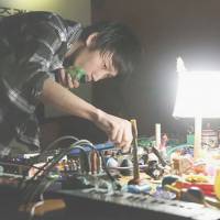 Making melodies: Experimental musican Asuna manipulates children’s toys, cheap keyboards and other nonstandard instruments at a recent performance in Seoul. Kanazawa artists play with genres