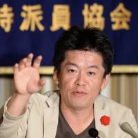 Not mainstream: Former Livedoor President Takafumi Horie faces the press Wednesday at the Foreign Correspondents’ Club of Japan in Tokyo. Hashimoto is Horie's kind of guy