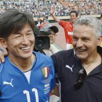 Soccer superstars Kazuyoshi Miura and Roberto Baggio share a laugh after an exhibition game celebrating J. League’s 20th anniversary. Italian soccer legends help celebrate J. League's 20th anniversary