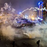 Battle lines drawn: Turkish police flood Taksim Square with tear gas as they clashed with angry protesters into the night in Istanbul on Tuesday. Calm returns to scene of Turkey's violent protests