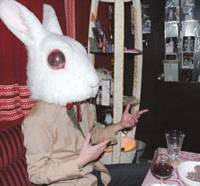 A customer at Sumire no Tenmado tries on the bar’s rabbit mask. Finding Tokyo's top theme bars