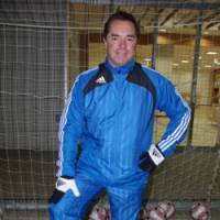 Tom Byer poses at his soccer school in Chiba. Byer holds a soccer clinic with children during a national Under-12 Championship qualifying tournament in Utsunomiya, Tochigi Prefecture in June. Tom-san, the big man in kids' soccer