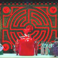 Dancing spectacle: The Queen of Hearts addresses her court in The Royal Ballet’s “Alice’s Adventures in Wonderland.” 'New' Royal Ballet spans the frontiers of dance
