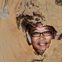 Ingrained appeal: Masahiro Miyajima, owner of wood-products firm Kukunoki. Log-jamming in Shin Kiba
