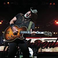 Rocking out: Ted Nugent performs in Roanoke, Virginia, on April 28 during a tour with Styx and REO Speedwagon. 'Motor City Madman' rocks political world