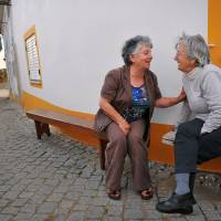 Golden girls: Two friends catch up in Vilas Ruivas, near the border with Spain in central Portugal. The small village has a population of just over 40, all of whom are over the age of 50. Portugal's baby bust feeding vicious cycle