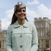 Attention!: Catherine, Duchess of Cambridge, attends the national review of Queen's Scouts at Windsor Castle in Berkshire, central England, in April. With baby, Kate's apprenticeship has just begun