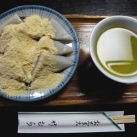 Sweet tea break: Triangles of kuzu mochi topped with kinako roasted soybean flour. Takemura: as traditional as it gets