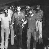Banged to rights: Gas-masked police take hostage-taking Jan-Erik Olsson, would-be robber of the Kreditbanken bank in Stockholm, into custody on Aug. 23, 1973. The Stockholm Syndrome turns 40