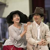 Family issues: As director Keralino Sandorovich leads the cast in a rehearsal of Russian dramatist Anton Chekhov’s “The Seagull” last week, actress Shinobu Otake (left) cozies up with lead actor Mansai Nomura. Japan's love affair with Chekhov