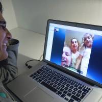 Skype you later: A woman communicates with her family abroad using Skype in Stockholm on Monday. Skype celebrates 10 years of shrinking the world