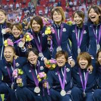 Upgraded: Members of Nadeshiko Japan celebrate their silver medal at the 2012 Olympics. Online petitions gaining popularity