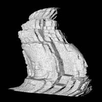 Setting the record straight: A warped 3-D image of a carved face of Buddha is generated from data gathered by an aerial scanner. A computer program is used to correct it. The Buddha's face is one of 173 carved on more than 50 towers at the Bayon temple complex located in the center of Angkor Thom in Cambodia. 3-D imaging technology helps bring the past to life