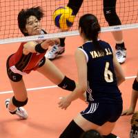 Strong effort: Japan’s Haruka Miyashita keeps the ball in play against China during Saturday’s FIVB Women’s World Grand Prix Finals match in Sapporo. China beat Japan in a five-game match. China outlasts Japan in hard-fought FIVB World Grand Prix match