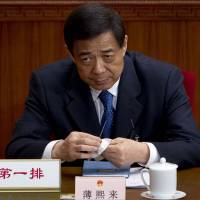 Bo Xilai Bo Xilai's bribery trial begins with China courts in spotlight
