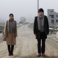 Road to ruin: Sakura Ando and Tasuku Emoto — a married couple in real life — play two unrelated characters in post-earthquake drama “Kyoko to Shuichi no Baai (Case of Kyoko, Case of Shuichi),” directed by Ando’s father Eiji Okuda Actor-director Okuda revisits wreckage of 3/11
