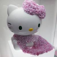 In the money: A Sanrio Co. Hello Kitty figure arranged by Japanese model Ai Tominaga is displayed at the Swarovski “House of Hello Kitty” event at Omotesando Hills in Tokyo on June 29, 2011. Cute craving a cash cow for Hello Kitty creator