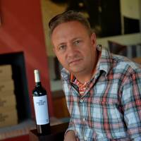 Aiming for greatness: Mark Kent of the Boekenhoutsklo vineyard in Franschhoek, South Africa, poses on Sept. 6. Young guns put South Africa wines back in contention