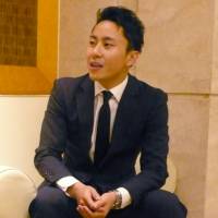 Golden opportunity: Japanese fencer Yuki Ota, winner of silver medals at the Beijing and London Olympics, speaks during an exclusive interview with The Japan Times in Dalian, China, on Wednesday. Successful Olympic bid thrusts Tokyo into spotlight, fencing star says