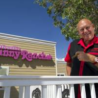 Smoke ’em if ya got ’em: Moonlite Bunny Ranch owner Dennis Hof stands outside the brothel in Mound House, Nevada, last month. Nevada brothels shriveling as Net disrupts oldest trade