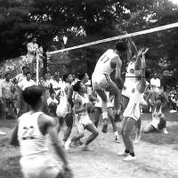 Fast paced: Members of Washington’s Chinese Youth Club play 9-man volleyball in Washington in 1952. This version, usually played on city streets with rules stressing players’ Chinese heritage, draws hundreds to tournaments. Volleyball as you've never seen it: Chinese '9-man'