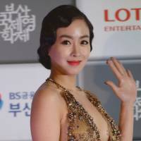 Reeling them in: South Korean actress Han Soo-ah arrives for the opening ceremony of the 18th Busan International Film Festival on Thursday. As Asian movie industry flourishes, industry looks to region for tie-ups