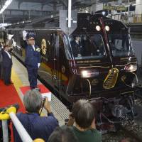 Riding in style: A spacious suite in the Seven Stars in Kyushu, the new luxury train operated by Kyushu Railway Co., is unveiled to the press earlier this month. The train departs from JR Hakata Station on Tuesday. Seven Stars sleeper promises railway luxury