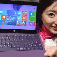 Faster: Microsoft's new Surface 2 tablet computer is presented at a press conference in Tokyo on Thursday. Microsoft unveils new Surface tablets