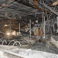 Gutted: The first floor of Abe Seikeigeka hospital lies charred and empty Friday in Fukuoka. Pre-dawn blaze guts hospital for aged in Fukuoka, kills 10