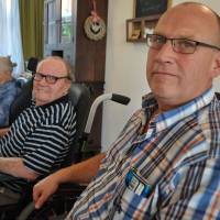 With a little help from our progeny: Henk Hom (right) sits beside his father at a retirement home in Stolwijk, in the central Netherlands, on Sept. 16. In order for his dad to enjoy the benefits of having a room at the facility, Hom assists him and other residents for four hours per month Dutch 'encouraged' to volunteer for older relatives