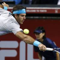 One to go: Argentina’s Juan Martin del Potro plays a shot from Spain’s Nicolas Almagro during their semifinal at the Rakuten Open on Saturday. Del Potro won 7-6 (9-7), 7-6 (7-1), Top seed del Potro, Raonic advance to Rakuten Open final
