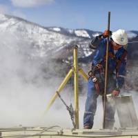 Changing the game: A worker checks water levels and temperatures in a series of tanks at an Encana Oil & Gas (USA) Inc. hydraulic fracturing operation outside Rifle, Colorado, in March. U.S. gas, oil revolution reshapes global energy trade