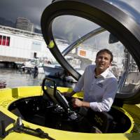 Water world: Erik Hasselman, commercial director of U-Boat Worx, stands inside a C-Quester 3 submarine during the Monaco Yacht Show on Sept. 25. Subs the new luxury item at Monaco