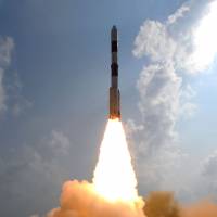 And they’re off: The Indian Space Research Organization’s PSLV-C25 rocket carrying the Mars Orbiter Spacecraft blasts off Nov. 5 from the launchpad at Sriharikota. Indian rockets aim for space market