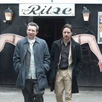 Protect and serve yourself: James McAvoy (right) plays a bent cop who goes spectacularly off the rails in “Filth.” Scottish police corruption has never been so fun