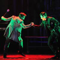 Gotcha: Deep-voiced Kim Beumrae (on the right) shows off some prowess in his title role in 'Jack the Ripper,' a hugely successful Korean musical whose almost entirely female audiences adore the male cast members and invariably end up screaming with glee as the performance draws to a close. 'Jack the Ripper' strikes again