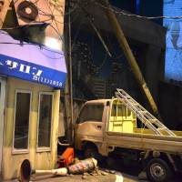 Real enough: This simulation of an earthquake's aftermath at the Tokyo Rinkai Disaster Prevention Park may use projections and sound effects instead of real shattering windows, but the effect is jarring. Preparing your kids for the Big One