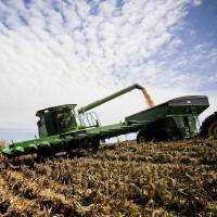 Trimmed: A farmer harvests corn for ethanol production with a combine harvester in Marshall, Missouri, in September 2010 EPA proposes reducing biofuel mandate