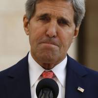 Tough going: U.S. Secretary of State John Kerry speaks to the press after his meeting with Palestinian President Mahmoud Abbas in Bethlehem, the West Bank, on Wednesday. Kerry waded again into the nitty-gritty of faltering Israeli-Palestinian peace talks earlier in the day, saying he was optimistic that tensions and difficulties could be overcome even between “two proud people” struggling to reach an accommodation Kerry works to keep Israeli-Palestinian peace talks on track