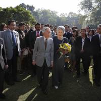 Imperial alliance: Emperor Akihito and Empress Michiko visit Lodi Gardens, home to the tombs of 15th- and 16th-century Mughal emperors, in New Delhi on Dec. 1. Emperor's apparent liberal leanings jar with Japan's right wing