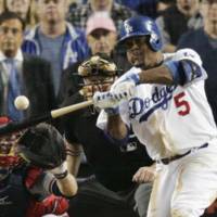 On the hot corner: The Los Angeles Dodgers have given third baseman Juan Uribe a new two-year contract. Dodgers re-sign 3B Uribe, shore up bullpen