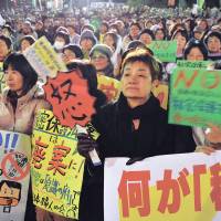 No secrets: Some 15,000 people gather in Hibiya, Tokyo, to protest the state secrets bill Dec. 6, the day the Diet passed it. A look back at the year's top 10 Japan news stories