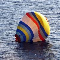 Flying solo: A photo provided by the Japan Coast Guard on Jan. 1, 2014, shows the hot air balloon that a Chinese man had attempted to land on the disputed Senkaku Islands. Coast Guard rescues Chinese man after attempt to land hot air balloon on Senkakus falls flat