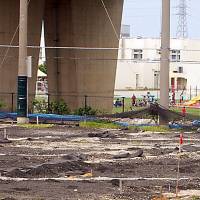 Dangerous game: Children play outside their school at the Kadena Air Base in November near dioxin-contaminated land (foreground) that is off-limits to the public. Kadena moms demand truth